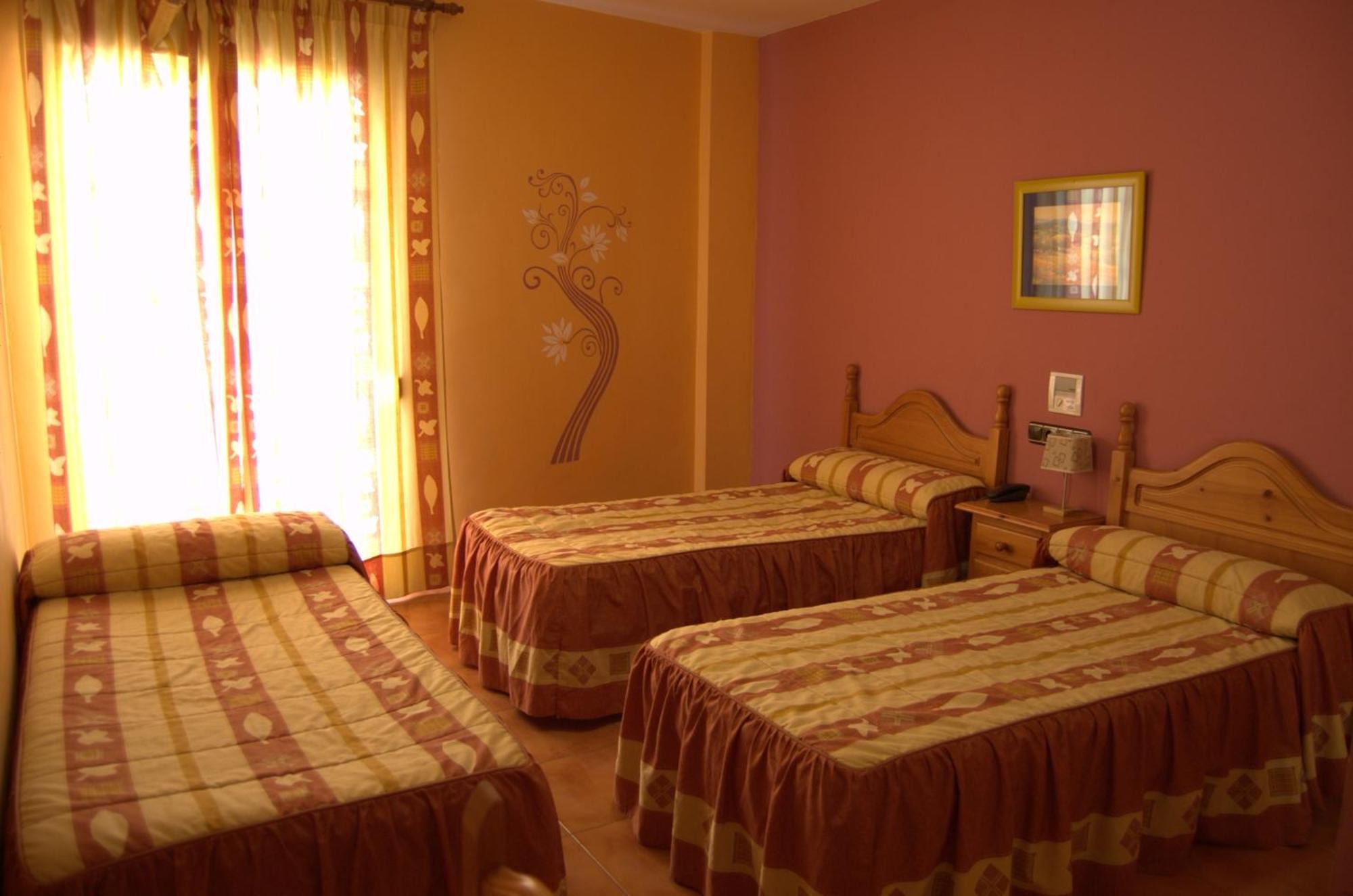 Quentar Hotel Habitación foto